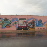 Escola Estadual Brigadeiro Fontenelle: jovens grafiteiros da Terra Firme, do grupo PeriferArt, pintaram o muro para fortalecer os laços da comunidade com o colégio. Foto: Eloiza Barbosa/Expresso na Perifa